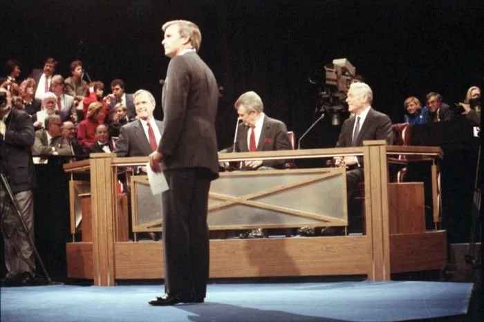 Vice President George Bush participates in a primary debate held in Washington, DC. Seated (L to R) are Vice President George Bush, Reverend Pat Robertson, and Secretary Alexander Haig.  Tom Brokaw is the moderator