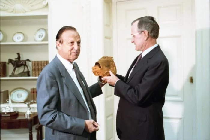 Stan Musial give President Bush an autographed glove
