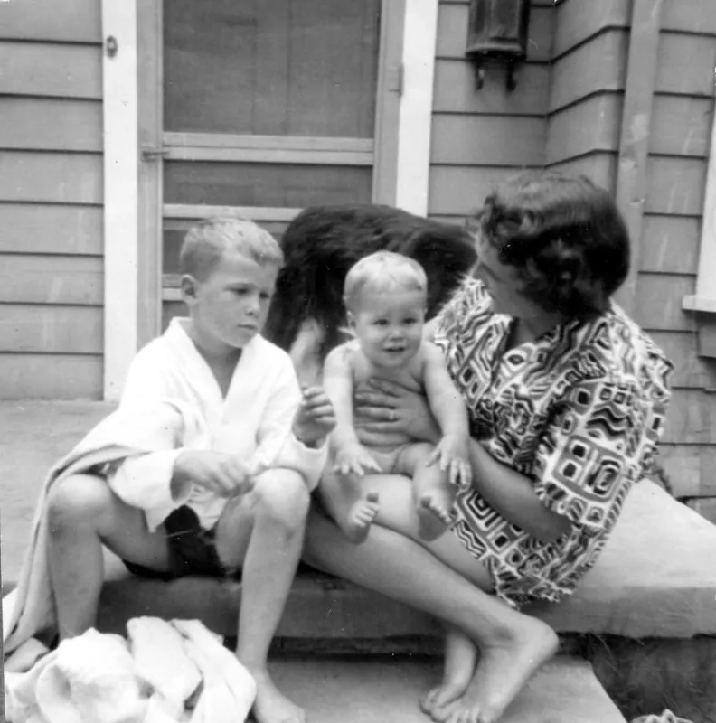 George W. and Barbara holding Jeb with Mark the dog in background, Midland, Texas