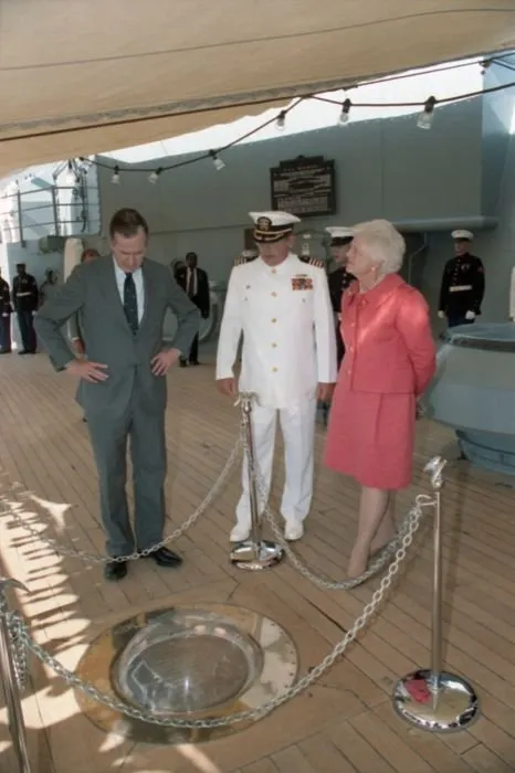 President Bush and Mrs. Bush receive a tour of the USS Missouri from Captain Albert Lee Kaiss