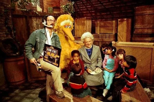 Barbara Bush reads to children on Sesame Street