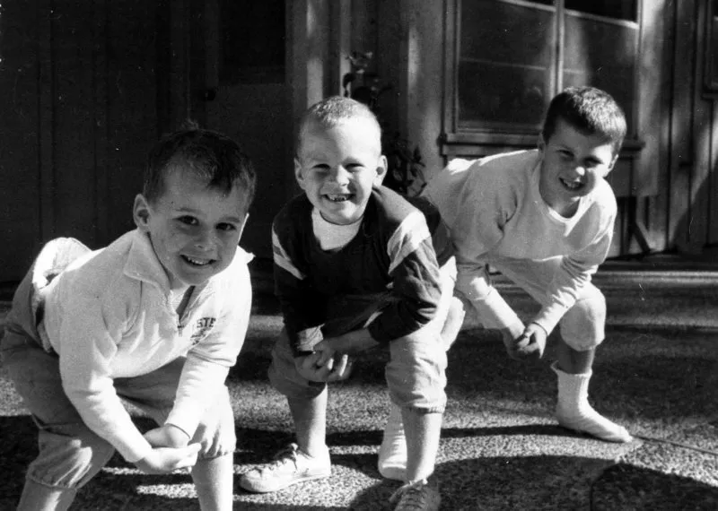 Marvin, Neil, and Jeb playing football