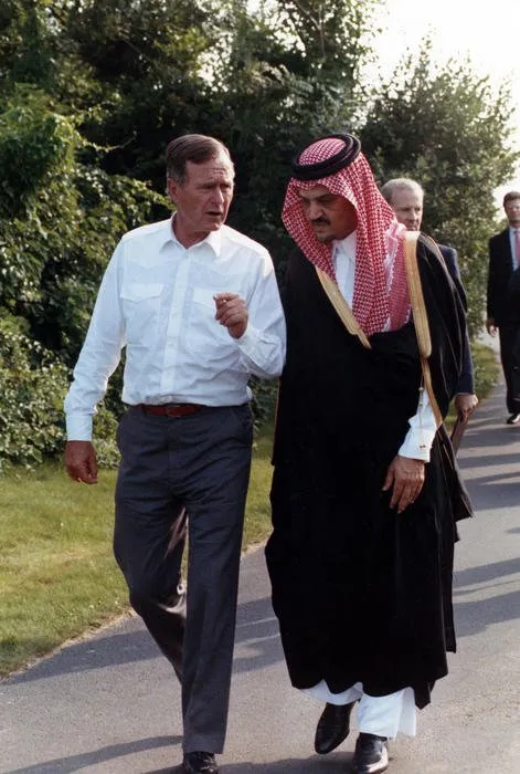 President Bush walks with Saudi Arabian Foreign Minister Prince Saud Al-Faisal, at Walker's Point, Kennebunkport, ME
