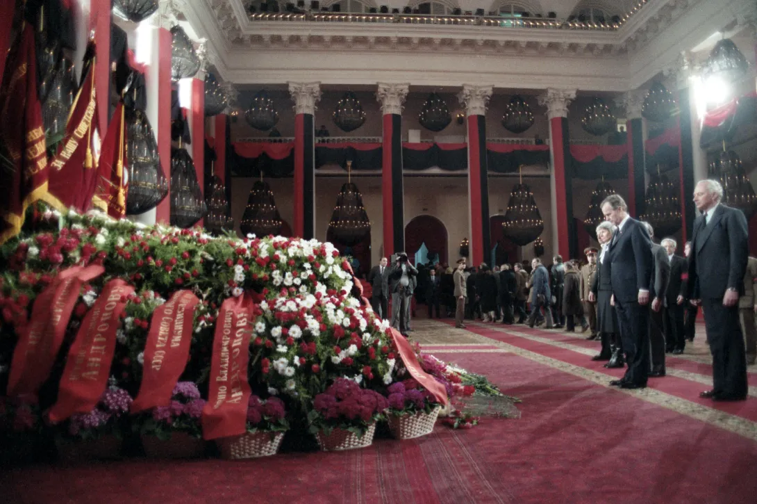 Vice President Bush, Senator Howard Baker, and U.S. Ambassador to the Soviet Union Arthur A. Hartman pay their respects at the funeral bier of the Chairman of the Presidium of the Supreme Soviet of the Soviet Union, Yuri Andropov in Moscow.