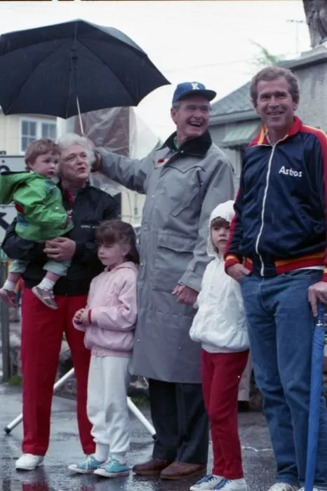 Vice President Bush and Mrs. Bush attend the Memorial Day parade in Kennebunkport, Maine with their family, including their son, George W. Bush