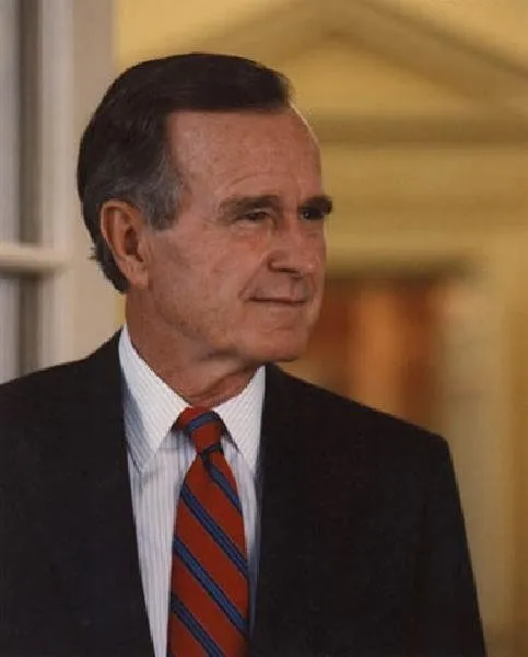 President Bush stands in doorway of Oval Office
