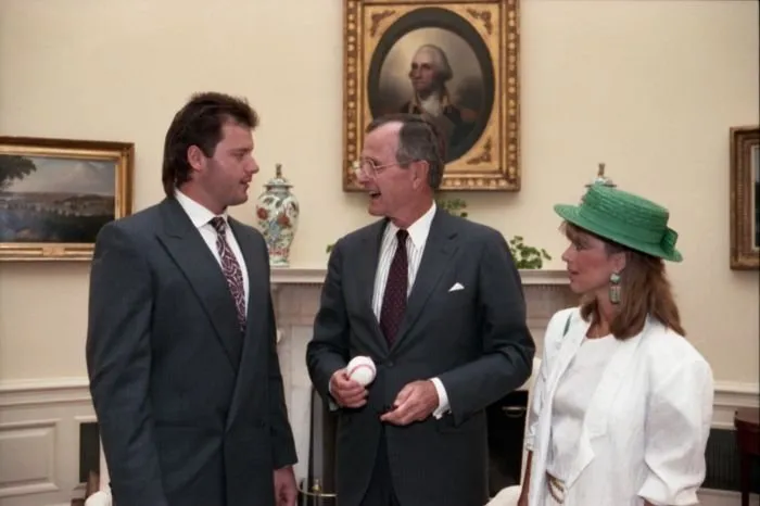 President Bush meets with Roger Clemens and his wife in the Oval Office
