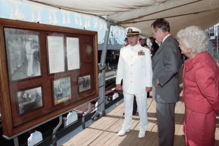 President Bush and Mrs. Bush receive a tour of the USS Missouri from Captain Albert Lee Kaiss on the 50th anniversary of the Japanese attack on Pearl Harbor.