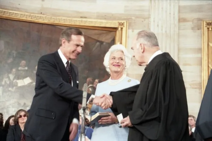 Supreme Court Justice Potter Stewart administers the Vice Presidential Oath of Office to Vice President George Bush as Mrs. Bush holds the Bible at the US Capitol