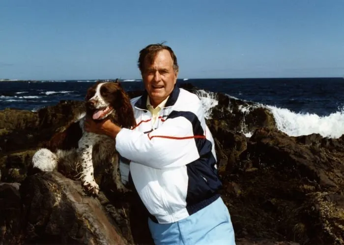 President Bush and Ranger on the rocks at Walker's Point