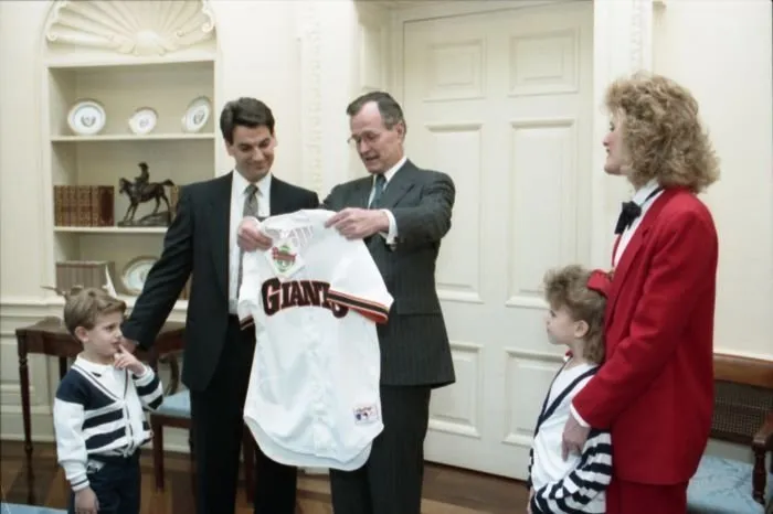 Dave Dravecky and his family present President Bush with a San Francisco Giants Jersey
