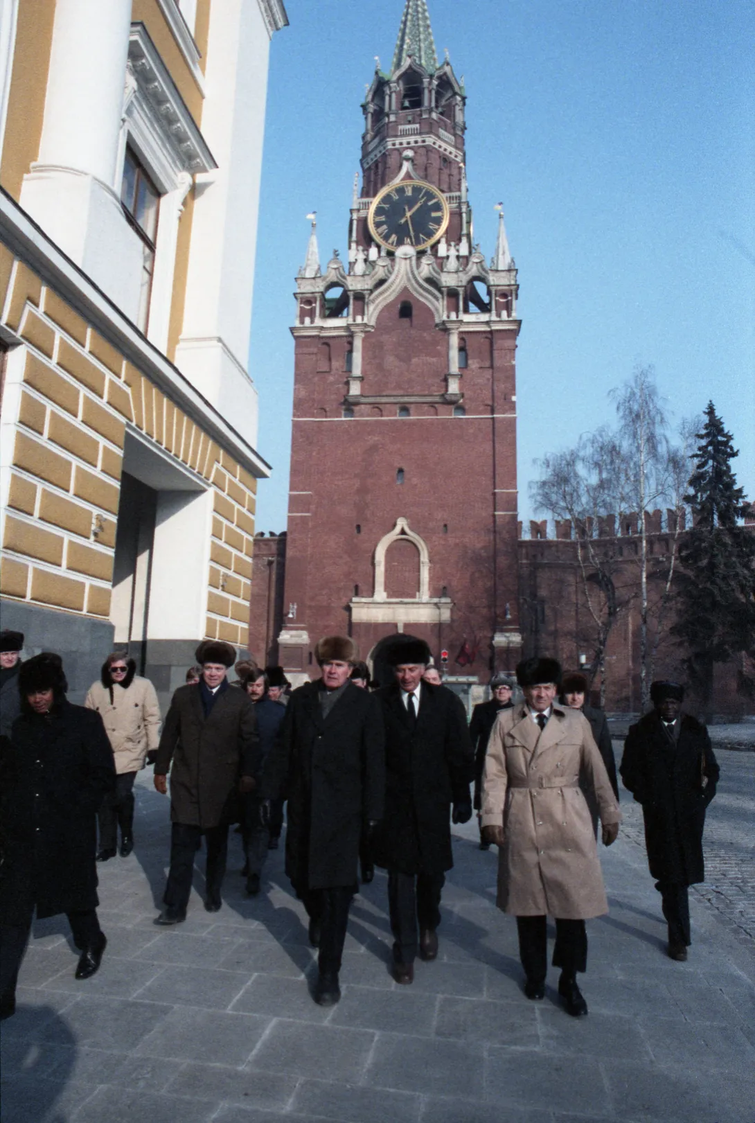 Vice President Bush walks with U.S. Ambassador to the Soviet Union Arthur A. Hartman at the Kremlin during his trip to Moscow for the funeral of the Chairman of the Presidium of the Supreme Soviet of the Soviet Union, Yuri Andropov.  Spasskaya Tower is...