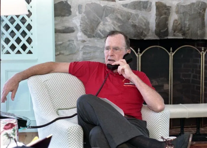 President Bush speaks on the telephone to Egyptian President Hosni Mubarak via telphone from his home at Walker's Point, Kennebunkport, ME