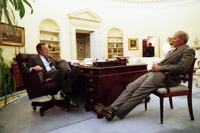 President Bush meets with James Baker in the Oval Office before debate rehearsal
