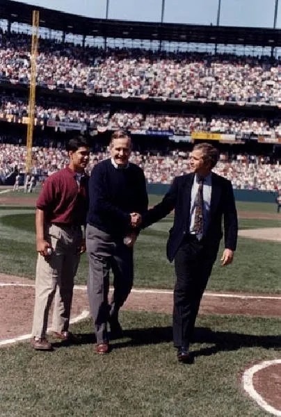 President Bush,  George W., and George P. throwing out opening pitch at Orioles Game