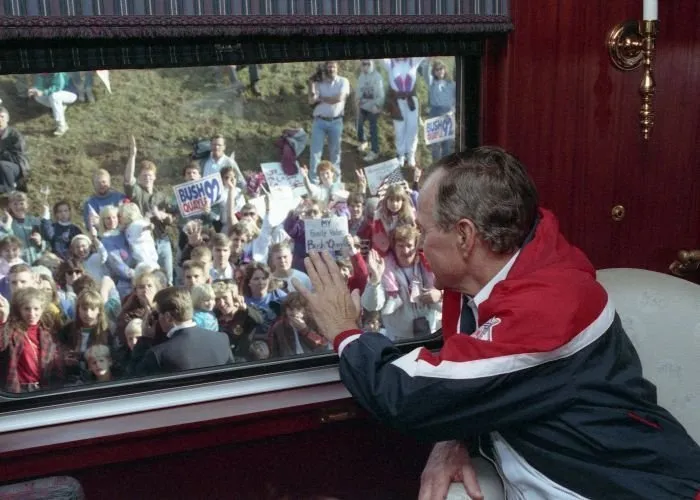 President Bush waves to supporters from the train in Spartanburg, SC
