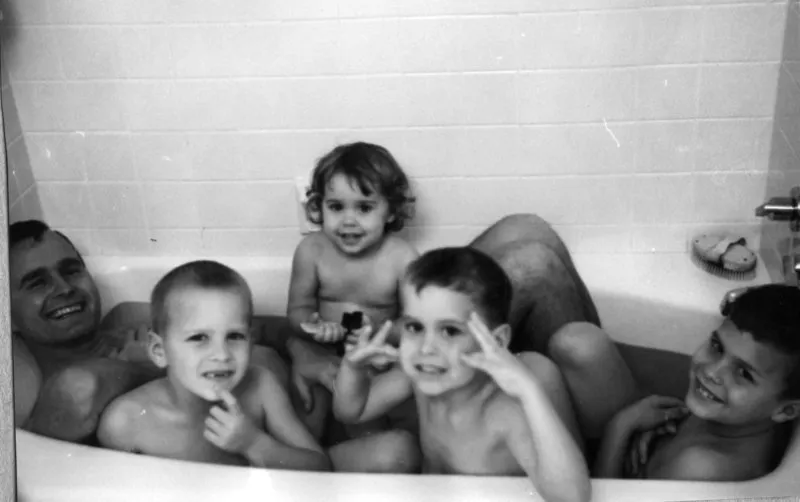 George Bush in the tub with his kids Neil, Doro, Marvin and Jeb