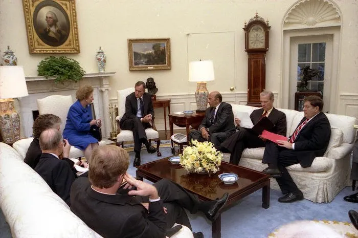 President Bush meets with Prime Minister Margaret Thatcher and NATO Secretary General Manfred Woerner in the Oval Office