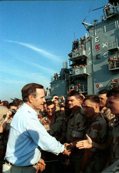 President Bush visits with service members aboard the USS Nassau in the Persian Gulf