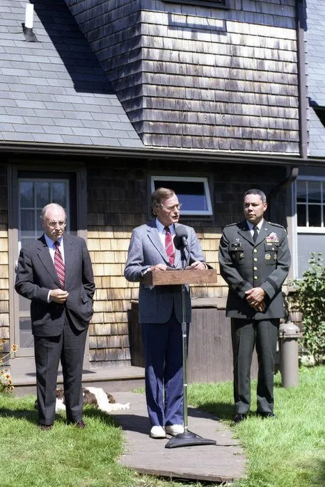 Secretary Cheney, President Bush, and General Colin Powell hold a press conference at Walker's Point, Kennebunkport, Maine