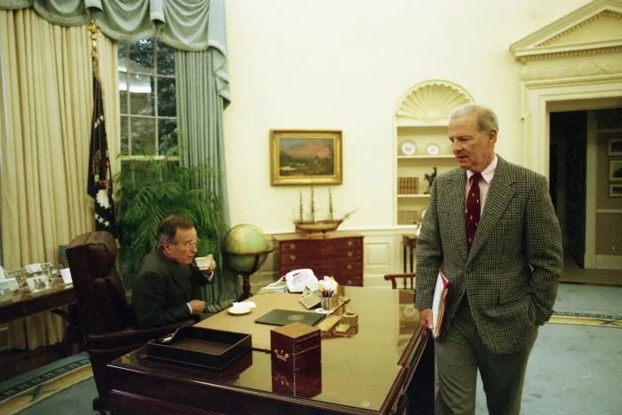 President Bush meets with James Baker in the Oval Office before debate rehearsal