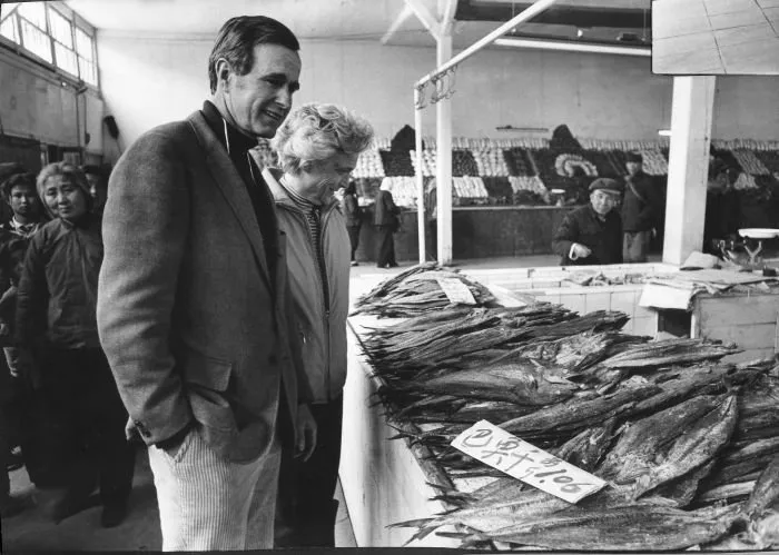 George Bush and Barbara Bush inspect Fish at the Local Market in China