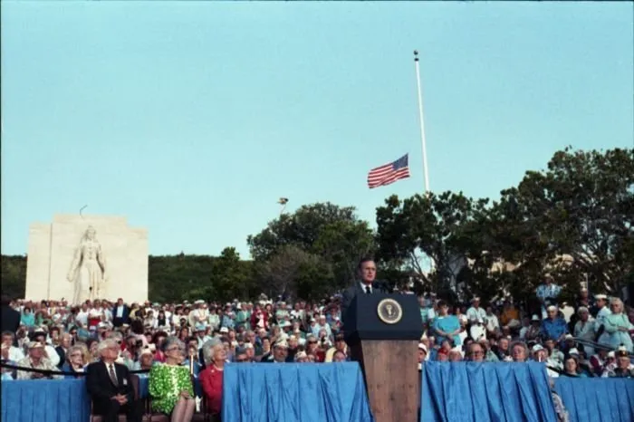 President Bush addresses the crowd at the National Memorial Cemetery of the Pacific during a ceremony honoring Pearl Harbor Survivors on the 50th anniversary of the attack.