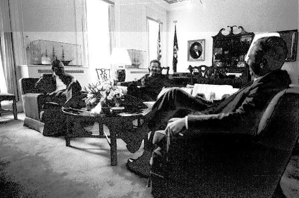 Vice President Bush meets with his National Security Advisor, Donald Gregg